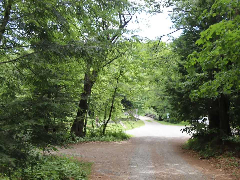 Gravel road that leads to the parking lot and boat ramp for Upper Spectacle Pond.