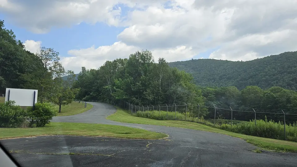 The road leading into the visitor center parking lot.
