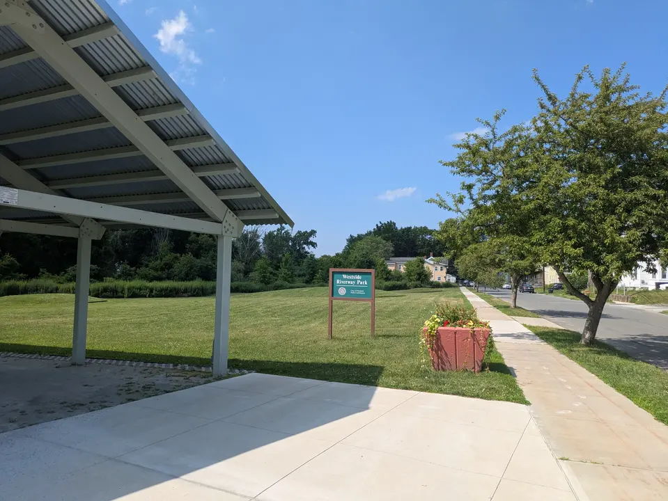 View of the pavilion and park name sign