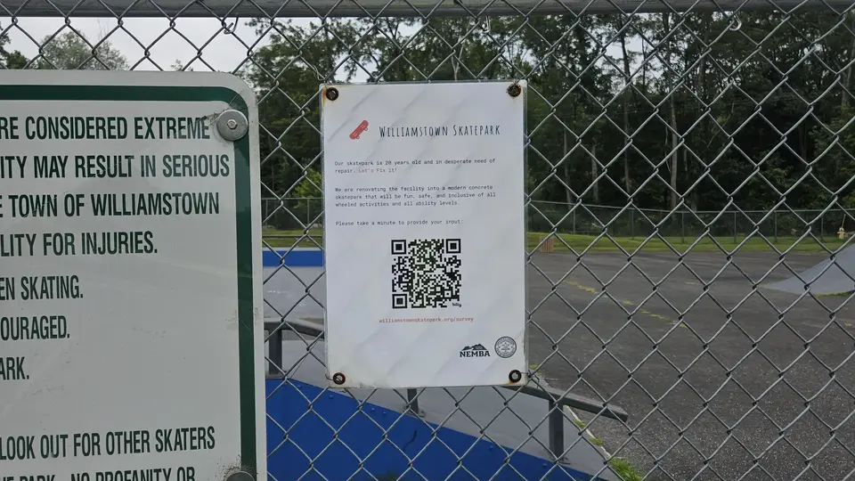 A flyer indicating efforts to revitalize the skate park, with a QR code attached.