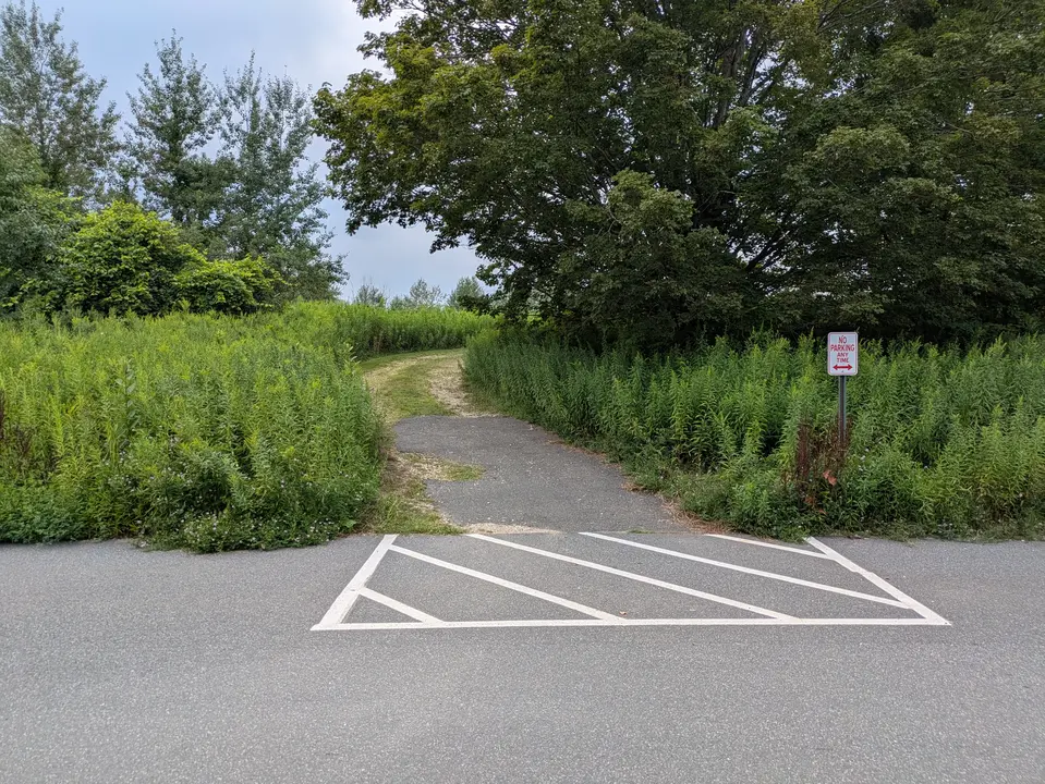 Entrance to the Jonathan Lambert Trail behind Melville Hall