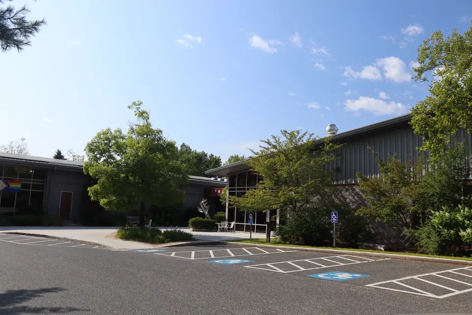 Exterior of the Berkshire South Regional Community Center, with accessible parking spaces in the foreground.