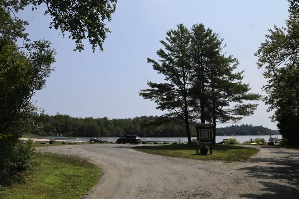 Entrance and parking area for Otis Town Beach.