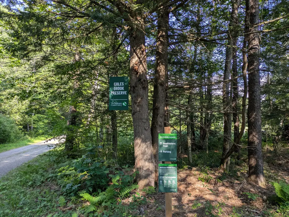 Trailhead sign at parking lot