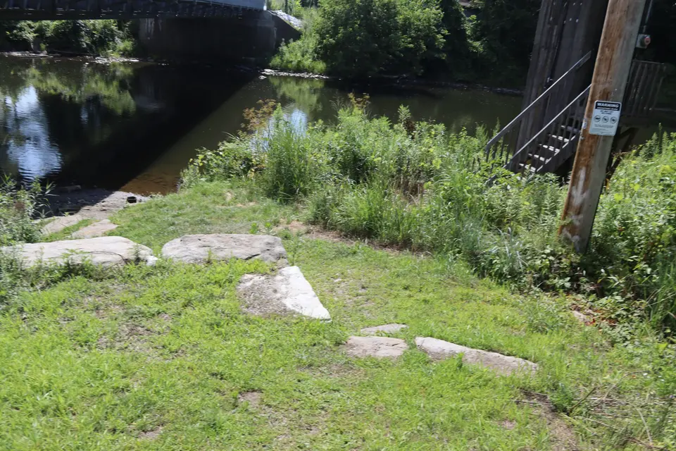 A rocky path leads to the boat launch at Division Street.