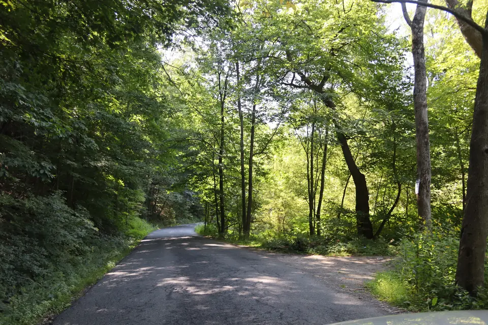 Entrance to the parking area (right) for Housatonic River Access, from East Sheffield Road southbound.