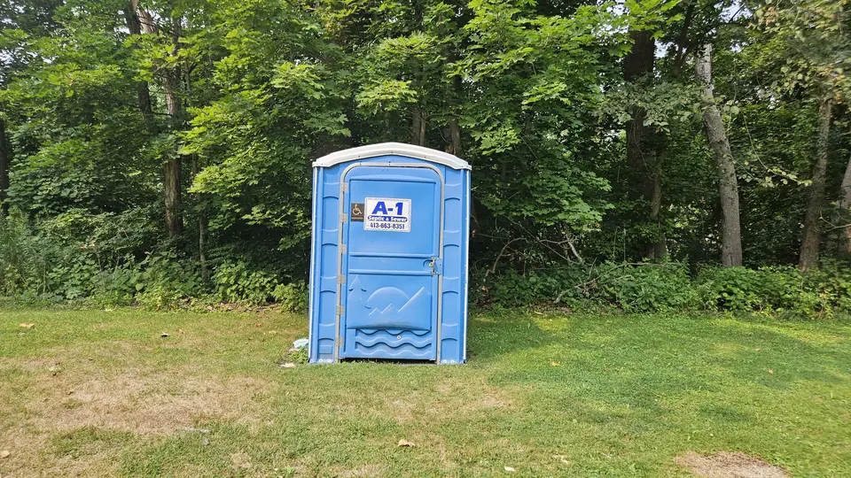 The accessible port-a-potty in the park.
