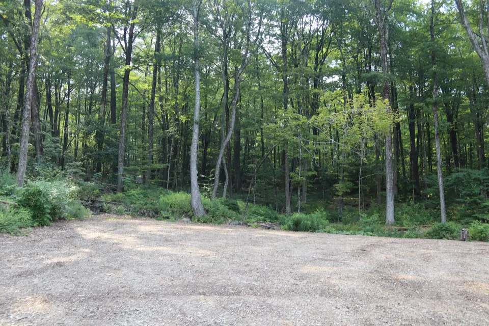 Parking area for Kennedy Park at Reservoir Road, located at the intersection of Reservoir Road and West Mountain Road.