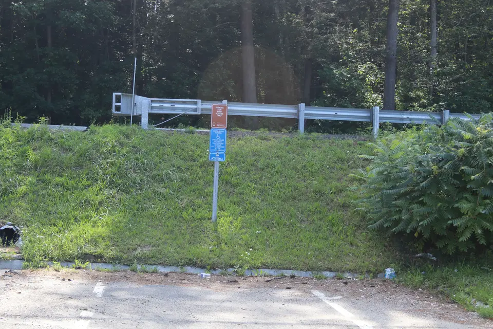 Van accessible handicapped parking space at parking area for the Shaw Pond Boat Ramp.