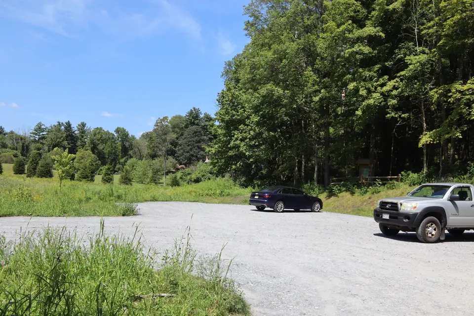 Parking area for Tom Ball Mountain, which consists of crushed stone and parking for 10 cars.